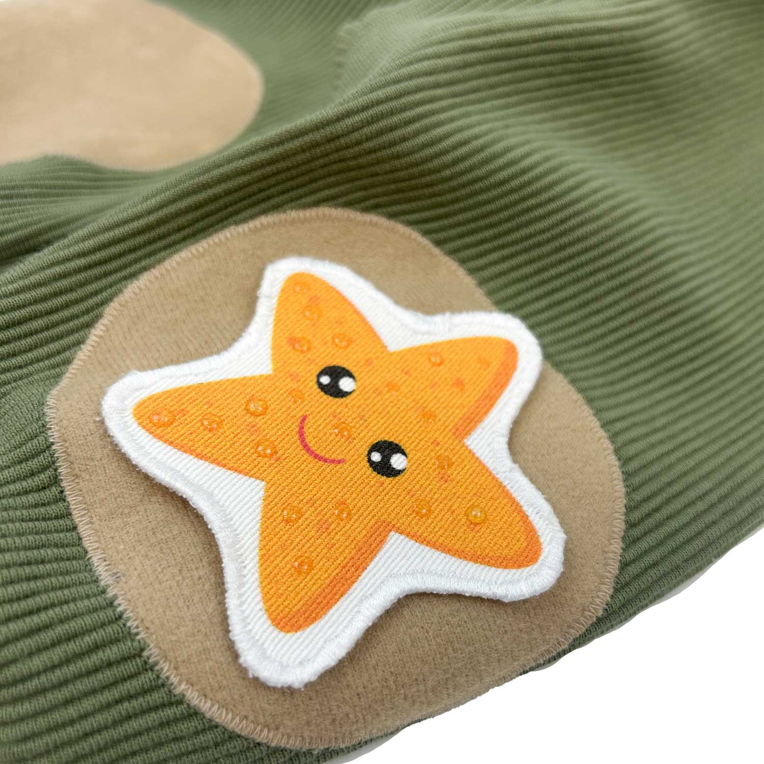 Seesterne Motiv für Krabbelhosen perfekt um das Knie eines Babys zu schonen 